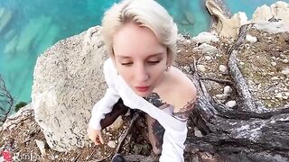A young girl passionately sucks cock on the ocean shore