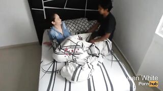 A young woman sneaks into the room of her friends to have fun