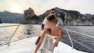 Petite babe enjoys passionate sex on a boat tour around Capri while the crew watches