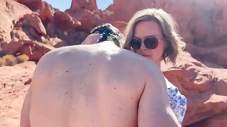 A hot wife is fucking her friend in front of her husband in the desert