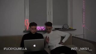 Two girls are having fun with some of the guys from their circle