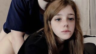 A cute girl is having fun with her roommate in a sensual way