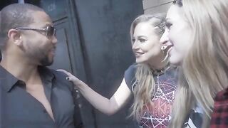 Two girls, Blake Blossom and Angel Youngs, share a huge cock in an intense threesome
