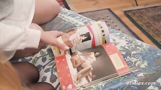 Lesbian beauties study Kama Sutra before engaging in passionate play