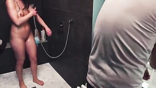 She ruined his orgasm while giving a handjob in the shower
