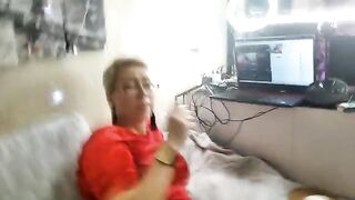 A mature woman plays sexy games with her husband, showcasing real orgasms
