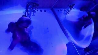 A blonde woman has sex in the bathroom with a big toy