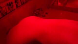 A blonde woman has sex in the bathroom with a big toy
