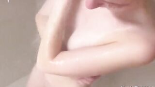 We shower, massage each other, and have sex over the couch in a steamy homemade scene