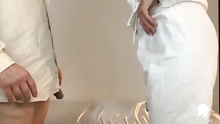 The nurse checks the patient's erection problems