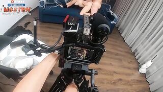 Behind the scene with a beautiful blonde and her impressive fake boobs