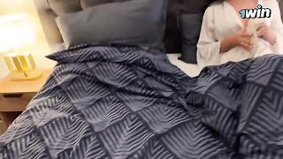 A hot step mom is sharing a bed with her stepson on a rainy night