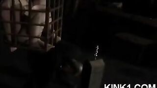 A slave in a cage fulfills all the orders of its owner