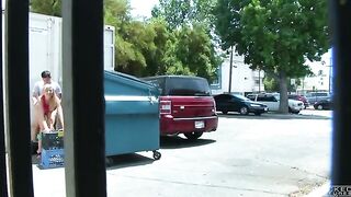 The couple was photographed having sex behind the garbage tank without noticing a camera