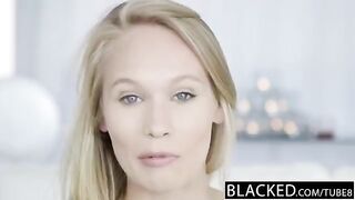 A cute blonde girl has sex with a negro for the first time
