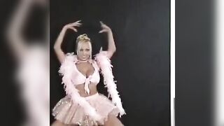 A sexy Russian girl is dancing and stripping erotically