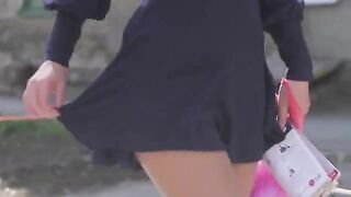 A very beautiful girl shows her body in stockings