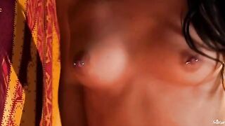 A chick with a nipple piercing plays with her tongue around it