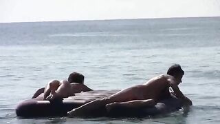 A girl is completely naked on the beach, she has no tanicle