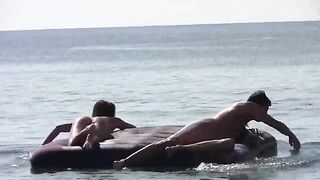 A girl is completely naked on the beach, she has no tanicle