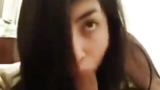 A lesson in sucking a guy’s dick, taught by a hot brunette