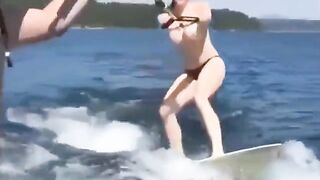 A girl has sex while skiing on the water surface