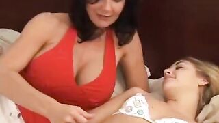 Hot lesbians having fun with a strapon, just like the passionate scenes you’d find on StrapOn, where sensual lesbian encounters are spiced up with the use of strap-on dildos and more
