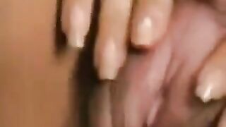 A close up shot of a big hairy pussy with a huge clitoris