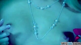 A blonde woman satisfies herself with a dildo, showcasing solo skills