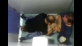 The camera in the toilet caught two guys engaging in some intimate action