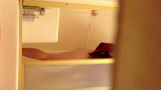 A hidden camera caught a naked girl in the shower, it's rather bold