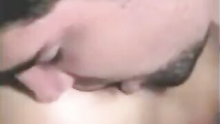 The guy is having fun with a strapon and another girl who fingers him