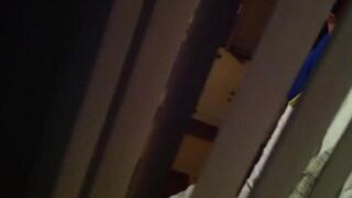 A man shoots his neighbors having sex with a hidden camera