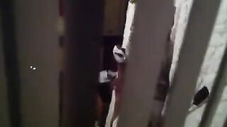 A man shoots his neighbors having sex with a hidden camera
