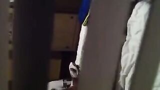 A man shoots his neighbors having sex with a hidden camera