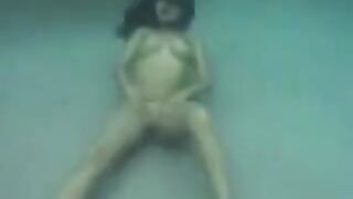 Busty brunette beauty fucked underwater in the ocean