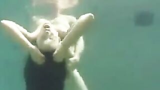 Busty brunette beauty fucked underwater in the ocean