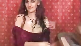 Masturbating her hairy pussy with fingers, a hot brunette