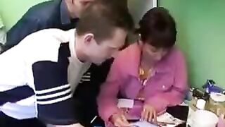 A Russian woman with natural breasts has sex with four men