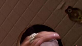 A beauty gave a blowjob through a hole in the toilet wall