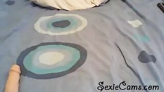 The beauty checks out her new toy on webcam and plays with it