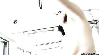 A girl in high heels masturbates and simulates sex with her fingers