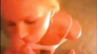 A blowjob at home ends with a cum shot in the face