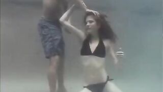 Redhead beauty makes love with a guy right in the swimming pool
