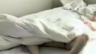 A man masturbates in the bedroom with a hidden camera