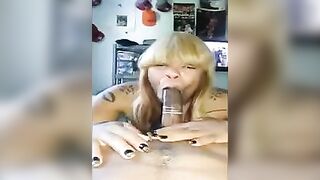 Black beauty took a long cock in her mouth wrapped in condom