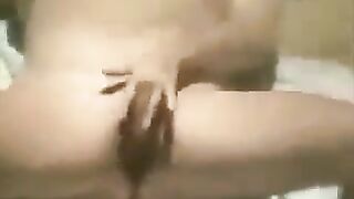 A guy masturbates on the beach with a hidden camera filming