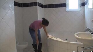 A hot brunette with natural tits has sex after taking a shower