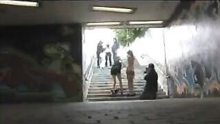 A woman in a state of undress has just been fucked on the street