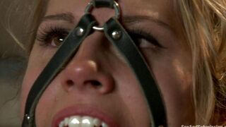 A woman with a beautiful breast is tied up and fucked hard